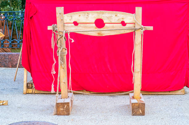 istock Medieval pads on a bloody background. Punishment or torture. 1157922467