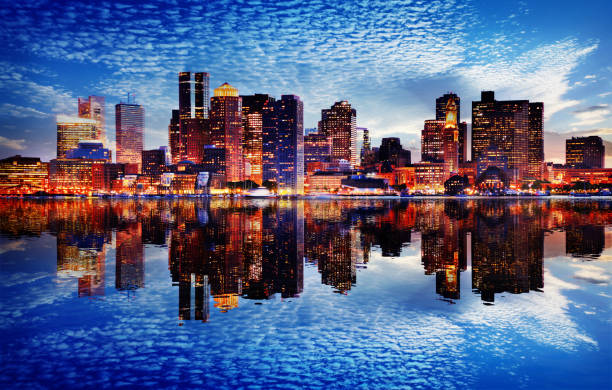 Boston City Sunset Boston City Sunset with Water Reflection buzbuzzer stock pictures, royalty-free photos & images
