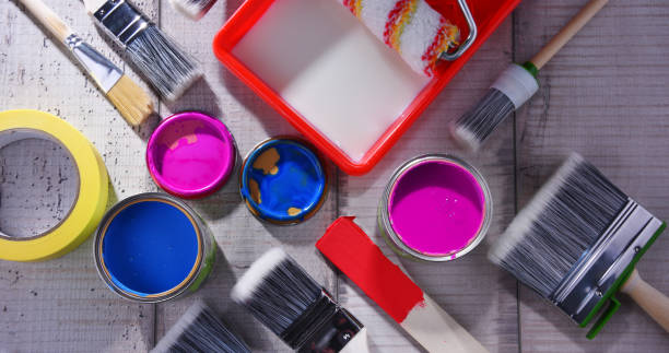 istock Paintbrushes of different size and paint can 1157924200
