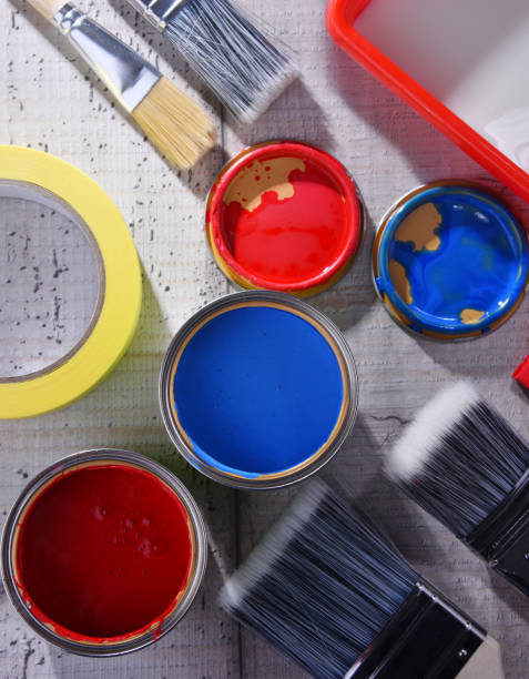 istock Paintbrushes of different size and paint can 1157924304