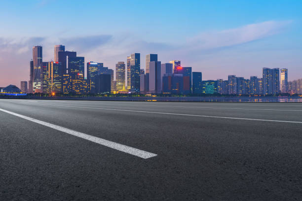 istock Road Pavement and Hangzhou Architectural Landscape Skyline 1157925370