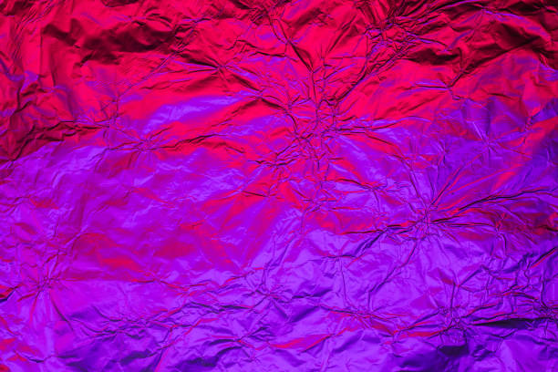 Purple red deformed background made of neon lights foil. Trendy duotone texture Purple red deformed background made of neon lights foil. Trendy duotone texture. flicker bird stock pictures, royalty-free photos & images