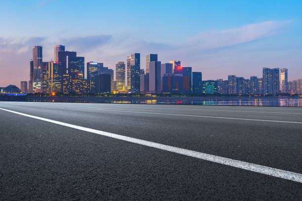 istock Road Pavement and Hangzhou Architectural Landscape Skyline 1157926447