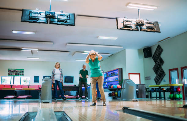 istock Senior Friends Bowling 1157926799