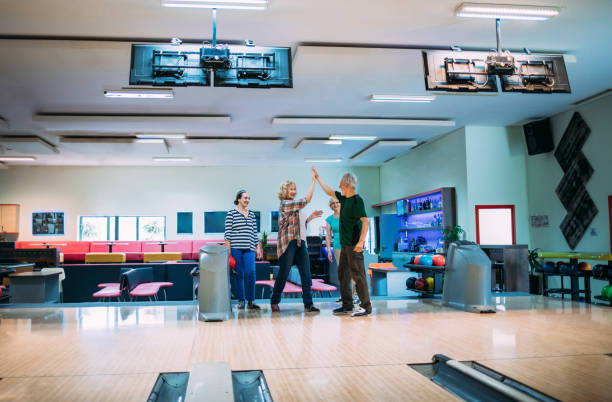 istock Senior Friends Bowling 1157926800
