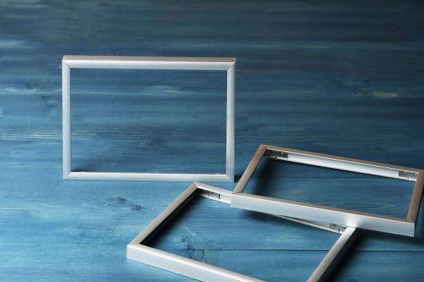 istock Photo frames on blue wooden background 1157927510