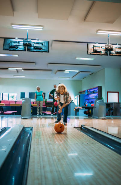 istock Senior Friends Bowling 1157928188