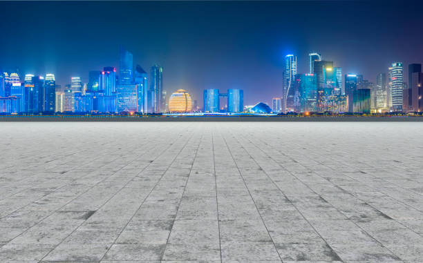 istock Empty Plaza Bricks and Hangzhou Architectural Landscape Skyline 1157928571