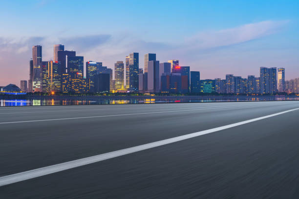 istock Road Pavement and Hangzhou Architectural Landscape Skyline 1157929571