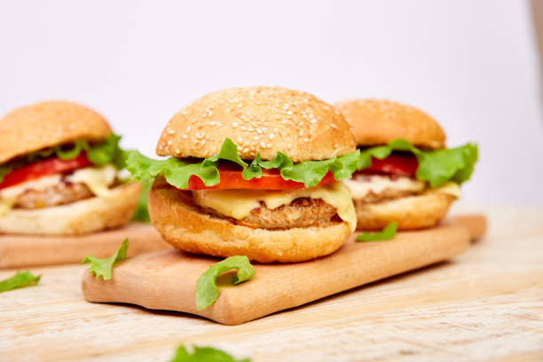 istock Craft beef burger  on wooden table on light background 1157929803