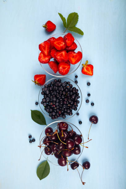istock Ripe berries in transparent bowls 1157930798