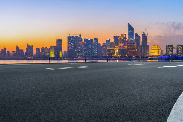 istock Road Pavement and Hangzhou Architectural Landscape Skyline 1157931634