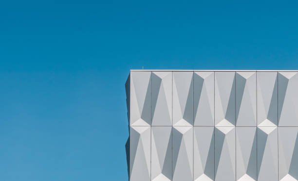istock Low Angle View Of Building Against Clear Blue Sky 1157931825