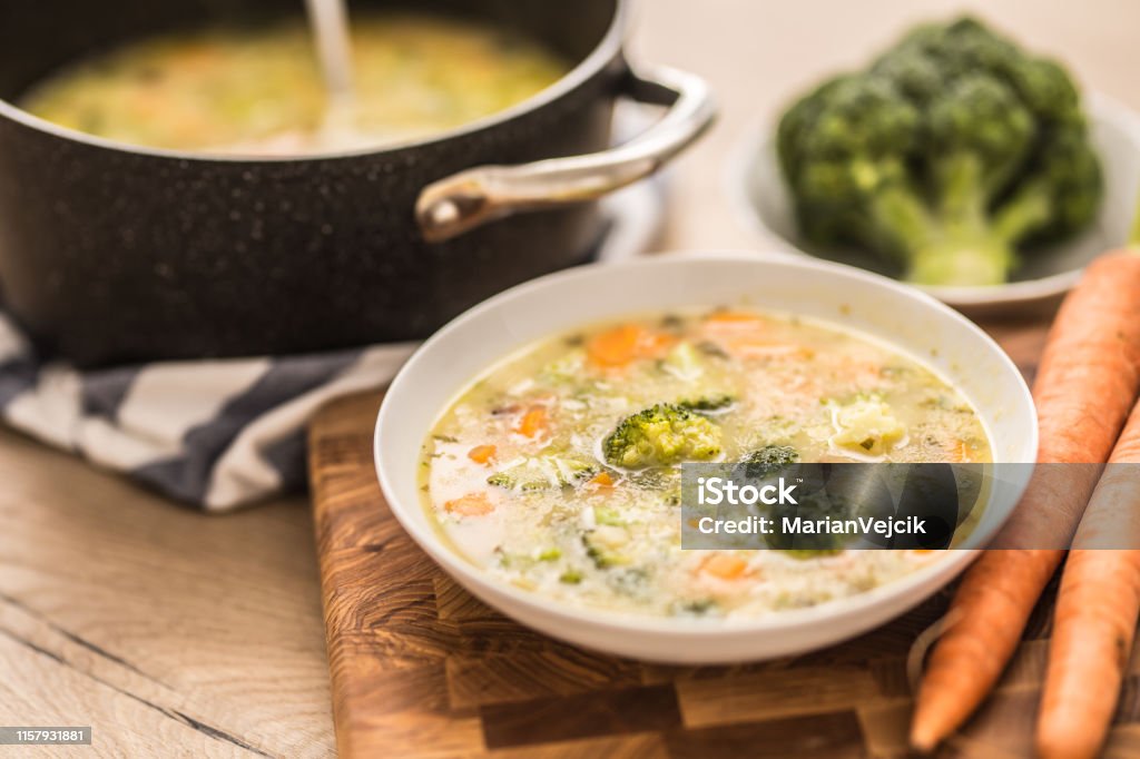 Vegetable soup from broccoli carrot onion and other ingredients. Healthy vegetarian food and meals Vegetable soup from broccoli carrot onion and other ingredients. Healthy vegetarian food and meals. Appetizer Stock Photo