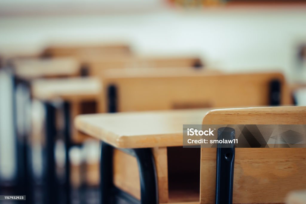 Back to school concept. School empty classroom, Lecture room with desks and chairs iron wood for studying lessons in highschool thailand without young student, interior of secondary education Classroom Stock Photo