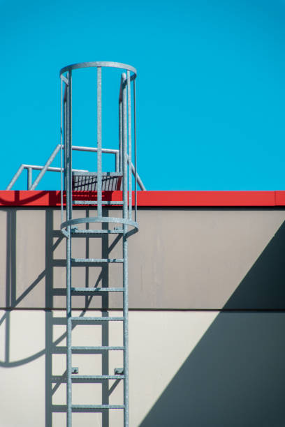 istock Ladder Against Clear Blue Sky 1157935356