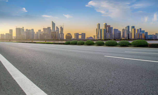 istock Road Pavement and Hangzhou Architectural Landscape Skyline 1157936153