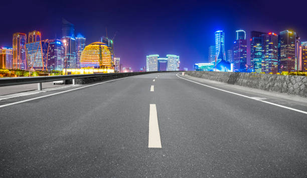 istock Road Pavement and Hangzhou Architectural Landscape Skyline 1157936245