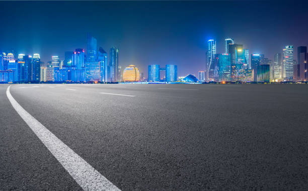 istock Road Pavement and Hangzhou Architectural Landscape Skyline 1157937404