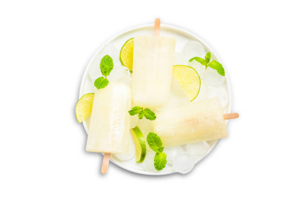 istock Lime and lemon juice popsicles, isolated on white 1157937990