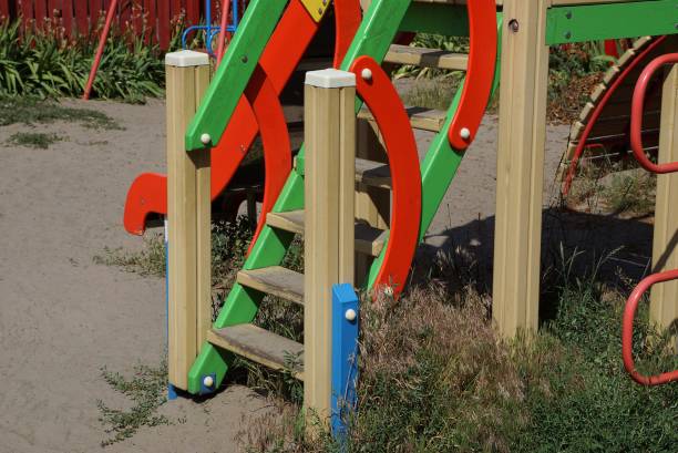 istock colored stairs in the playground on the sand 1157940474
