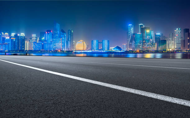 istock Road surface and Hangzhou architectural landscape skyline 1157941991