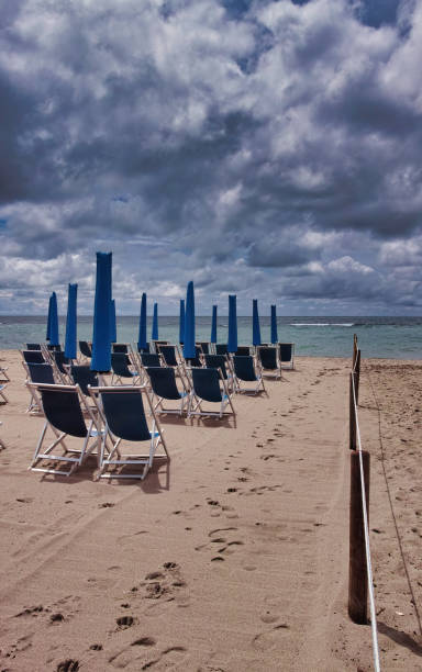 picturesque view on italian sandy beach marina di vecchiano nearby pisa, tuscany  italy - marina di pisa imagens e fotografias de stock