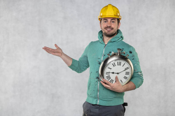 istock concept of time in matters of construction, builder and clock 1157946660