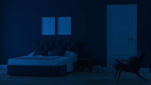 istock Modern house interior. Bedroom in blue tonnes. Night. Evening lighting. 3D rendering. 1157946700