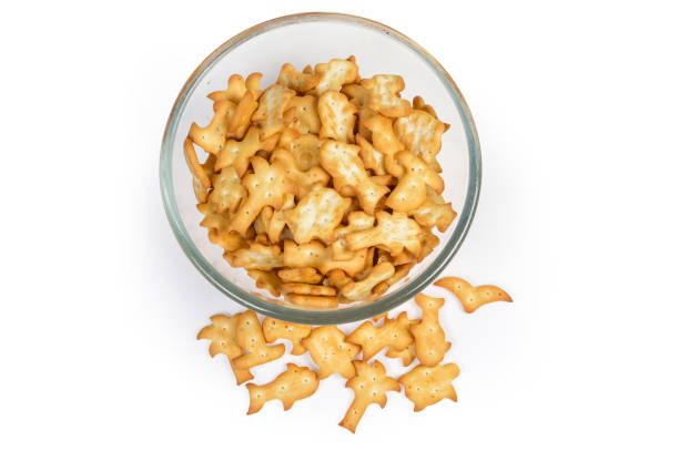 istock Top view of salty crackers various forms in glass bowl 1157946870
