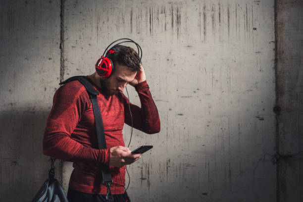 Athlete choosing a song from a playlist