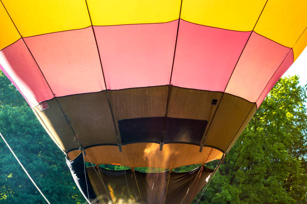 istock Hot Air Balloon Taking Off with Burners On 1157947429