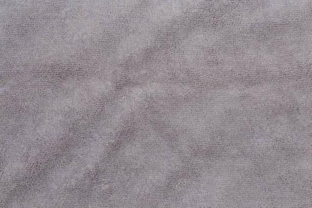 istock Gray bath towel texture for background and design. 1157949391