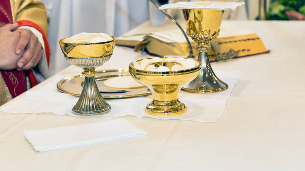 istock Catholic religious ceremony of Eucharist - selective focus 1157951328