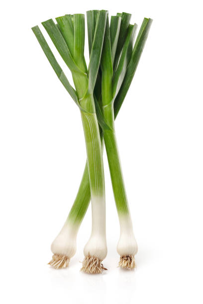 istock Fresh green garlic isolated on white 1157952168