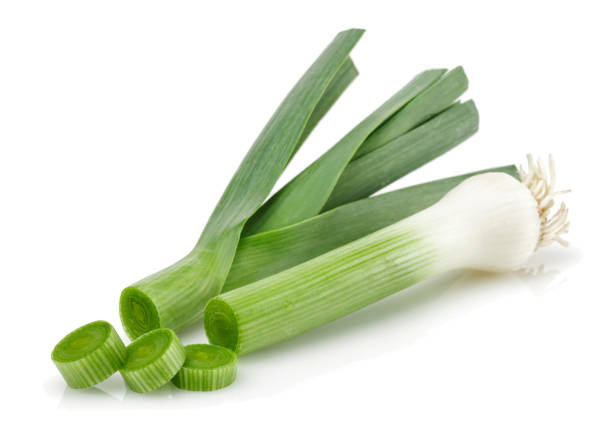 istock Fresh green garlic isolated on white 1157952320