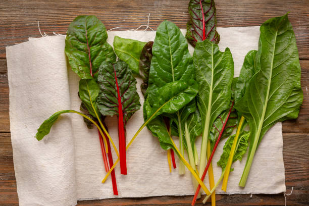 istock Fresh green swiss chard leaves from above 1157952379