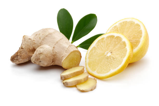 istock Fresh ginger and lemon with leaves isolated 1157952772