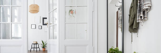 istock Home interior with wooden door 1157953664