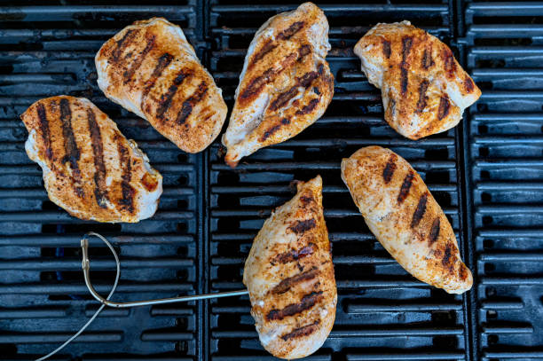 istock grilled striped chicken on a grill in Sweden 1157957297