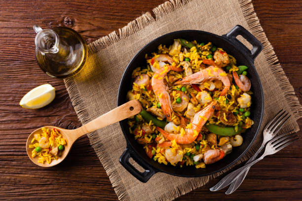 istock Traditional Spanish paella with seafood and chicken. 1157959584