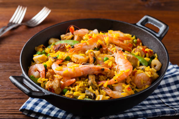 istock Traditional Spanish paella with seafood and chicken. 1157960213