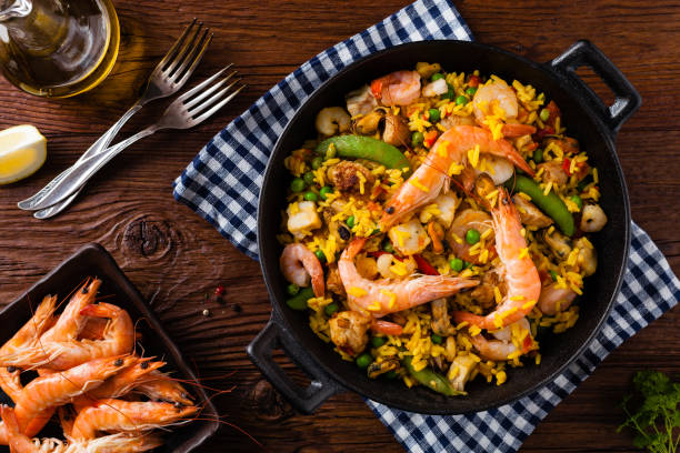 istock Traditional Spanish paella with seafood and chicken. 1157960593