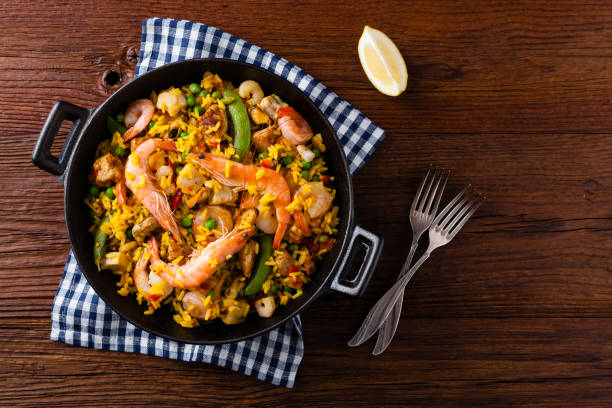 istock Traditional Spanish paella with seafood and chicken. 1157961084