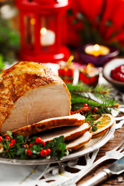 istock Christmas baked ham, served on the old plate. 1157961657