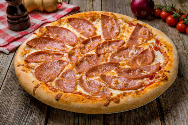 istock Pizza with ham and mushrooms 1157961911