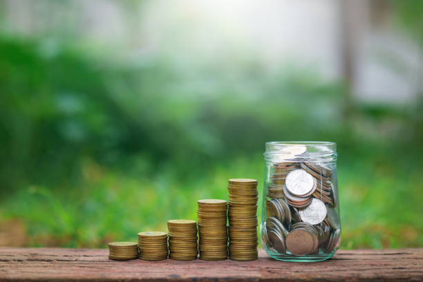 istock Save money concept with coin stack growing business 1157965103