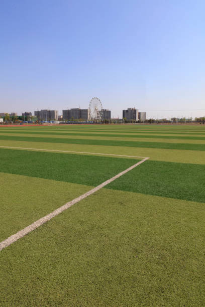 istock Green plastic playgrounds and buildings 1157967119