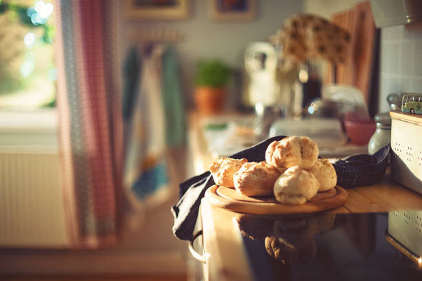 fresh home-baked wheat rolls are ready for breakfast in the morning sun
