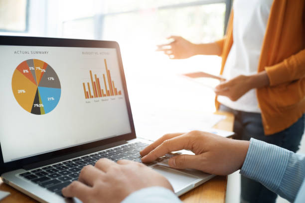 istock Group of Business people meeting analyzing financial documents in workplace. 1157972115